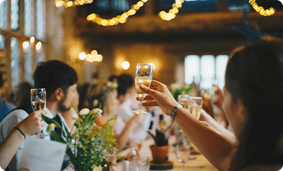 People toasting at a corporate partner gathering